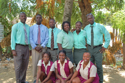 Ralph (in blue shirt) with the rest of the school staff in October 2008.